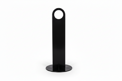 A minimalist black plastic wall hook with a circular hanging loop at the top and a round base, shown against a plain white background.